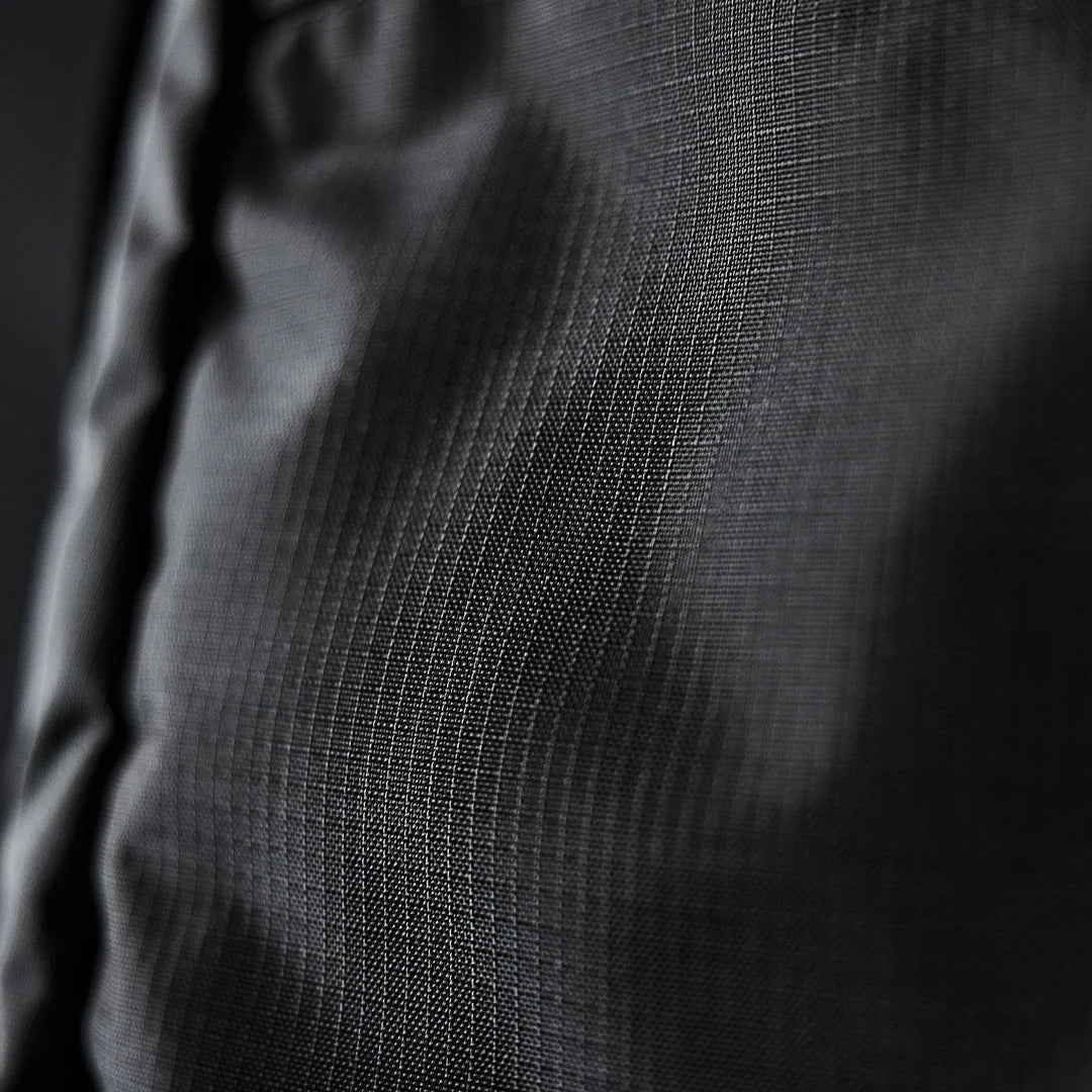 CRÈME DE LA CRÈME BACKPACK SLING