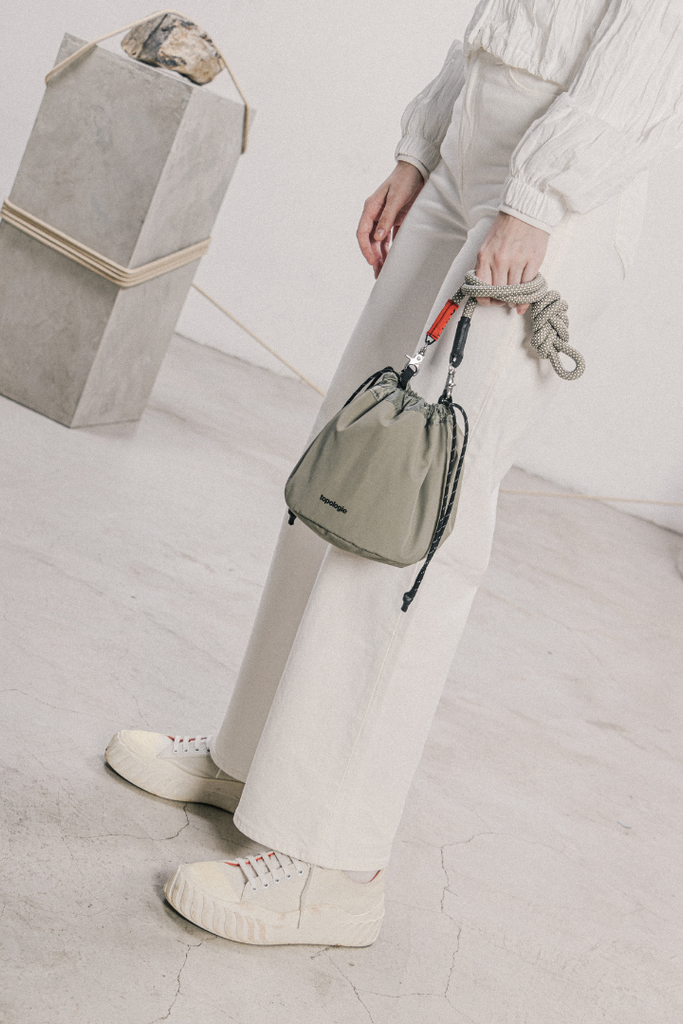 A.I. AFRICAN INTELLIGENCE ELEGANT ENERGY MINI DUFFLE - SANDFLOWER COLLAB