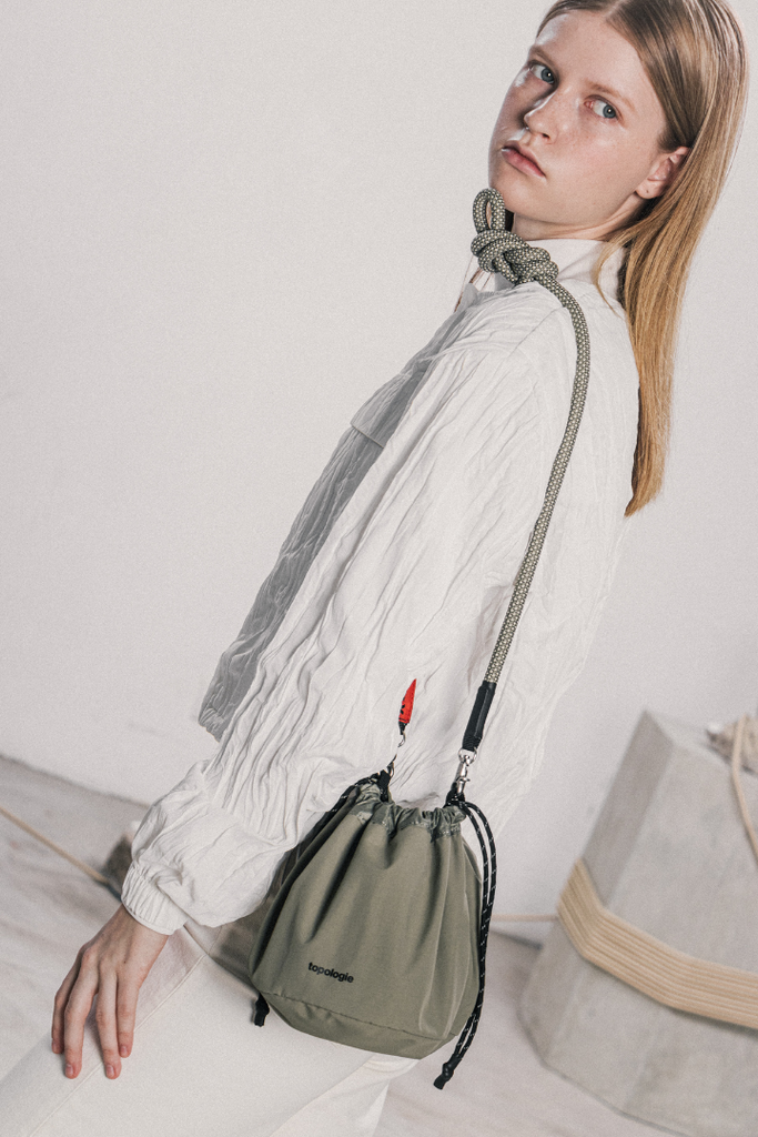 A.I. AFRICAN INTELLIGENCE ELEGANT ENERGY MINI DUFFLE - SANDFLOWER COLLAB