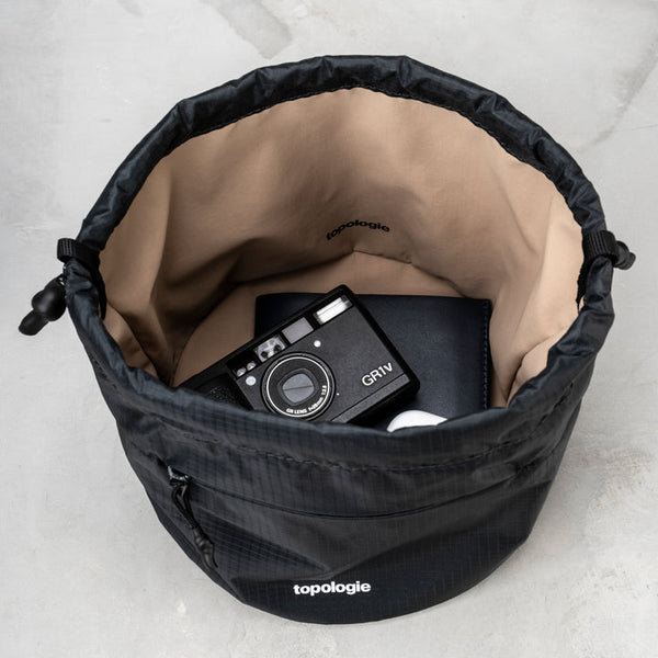 A.I. AFRICAN INTELLIGENCE ELEGANT ENERGY MINI DUFFLE - SANDFLOWER COLLAB