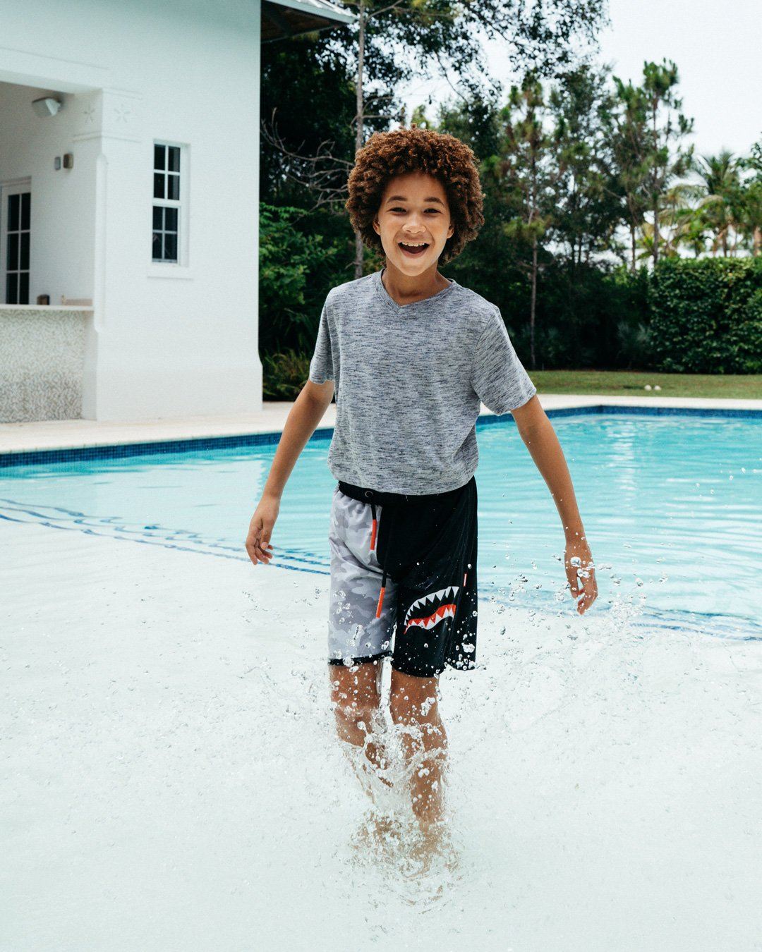 KIDS DAMAGE CONTROL SWIM TRUNKS